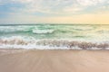 storm on the sandy beach at sunrise. Royalty Free Stock Photo