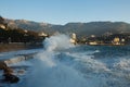 Storm at the sea and embankment street of Yalta city in Crimea in the morning on 24.10.2016. Big waves and tides wash Royalty Free Stock Photo