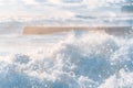 Storm at sea. The waves break on the shore.Sea foam. A beautiful spray of sea water. Royalty Free Stock Photo