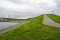 Storm surge barrier and hill