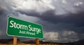 Storm Surge Just Ahead Green Road Sign and Stormy Clouds