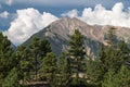 Stormclouds Forming Behind the Twin Peaks Mountain in Central Colorado. Royalty Free Stock Photo
