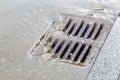 Stormwater street drain during heavy rain Royalty Free Stock Photo