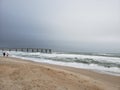 Stormy beach saint Augustine waves pier Royalty Free Stock Photo