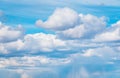 Stormy blue sky background with fluffy huge clouds. Sunny blue sky background with clouds.