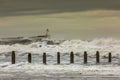 A stormy and blustery day at Blyth beach in Northumberland, as the waves batter the coast Royalty Free Stock Photo