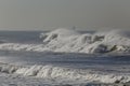 Stormy breaking white waves