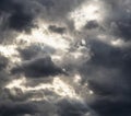 Stormy clouds gray low key sky with dramatic shadows and lights. Royalty Free Stock Photo