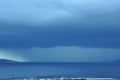 Stormy clouds and rain over adriatic sea and city of Rijeka in Croatia Royalty Free Stock Photo