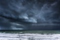 Stormy clouds and rain on sea Royalty Free Stock Photo