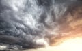 Stormy clouds at sunset, natural background Royalty Free Stock Photo