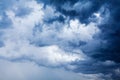 Stormy cloudy sky closeup, dark blue thunderclouds, white cumulus clouds, rainy thunderstorm landscape, overcast bad weather Royalty Free Stock Photo