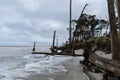 Stormy day on a coastal landscape, very high tide with rough surf and sea foam Royalty Free Stock Photo