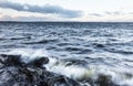 Stormy day next to lake in December in Finland Royalty Free Stock Photo