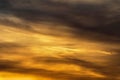 Stormy dramatic sky background with yellow red and orange clouds. Sunset skyline. Storm on the beach. Royalty Free Stock Photo