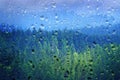 Stormy Forest in Mountains Clouds and Fog Weather Seen Through a Rain Covered Window Royalty Free Stock Photo