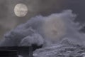 Stormy full moon night in the ocean Royalty Free Stock Photo