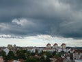 Stormy grey clouds over the city in september. Stormy weather.