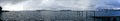 Stormy grey cloudy sky over Auckland and Waitemata Harbour in wi Royalty Free Stock Photo