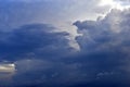 A stormy landscape with blue Cumulus clouds on the horizon Royalty Free Stock Photo