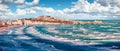 Stormy morning view of Vieste town. Panoramic spring seascape of Adriatic sea, Gargano National Park, Apulia region, Italy, Europ Royalty Free Stock Photo