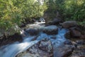 A stormy mountain stream with clear water among the rocks