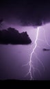 Stormy Night: Lightning Illuminating Black Clouds Royalty Free Stock Photo