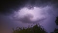 Stormy night sky lightning clouds