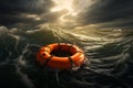 Stormy ocean scene Orange life buoy precariously floats amid tumult Royalty Free Stock Photo