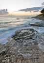 Stormy rocky beach sunset on the coast of Adriatic Sea Royalty Free Stock Photo