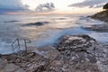 Stormy rocky beach sunset on the coast of Adriatic Sea Royalty Free Stock Photo