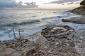 Stormy rocky beach sunset on the coast of Adriatic Sea Royalty Free Stock Photo