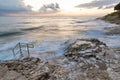 Stormy rocky beach sunset on the coast of Adriatic Sea Royalty Free Stock Photo