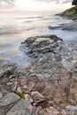 Stormy rocky beach sunset on the coast of Adriatic Sea Royalty Free Stock Photo