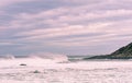 Stormy sea with beautiful turquoise water and scenic spraying wa