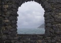 Stormy sea seen from a window Royalty Free Stock Photo