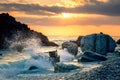 Stormy Sea waves splash up to the sky with sun. Sunset at Sea. Storm. Seascape Royalty Free Stock Photo