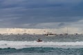 Stormy skies hangover boats anchored off shore Royalty Free Stock Photo