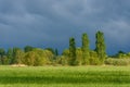 Stormy skies over a meadow in rainy spring weather Royalty Free Stock Photo