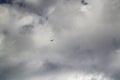 stormy sky clouds with very small plane Royalty Free Stock Photo
