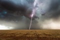 Stormy sky with dark clouds and lightning strike Royalty Free Stock Photo