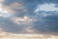 Stormy sky with dark colors brighter edges on the clouds