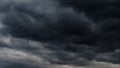 stormy sky, dark dramatic clouds, thunderstorm, rain and wind, extreme weather, abstract background Royalty Free Stock Photo