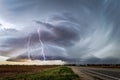 Stormy sky with supercell thunderstorm and lightning bolts