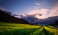 Stormy sky over bright countryside landscape