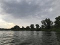 Stormy sky over the river in summer Royalty Free Stock Photo