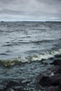 Stormy sky over the sea or lake with dark water. Wild Nature Dramatic Background Royalty Free Stock Photo