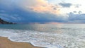 Stormy sky with sun rays over sea Royalty Free Stock Photo