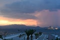 stormy sky and sunset over the castle Bourtzi in Nafplio Royalty Free Stock Photo