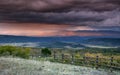 Stormy sky at sunset over San Juan Mountain range and Autumn Fall color of the Dallas Divide Ridgway Colorado Royalty Free Stock Photo